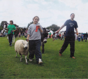 Sarah showing sheep, winner of Most Obedient Animal
